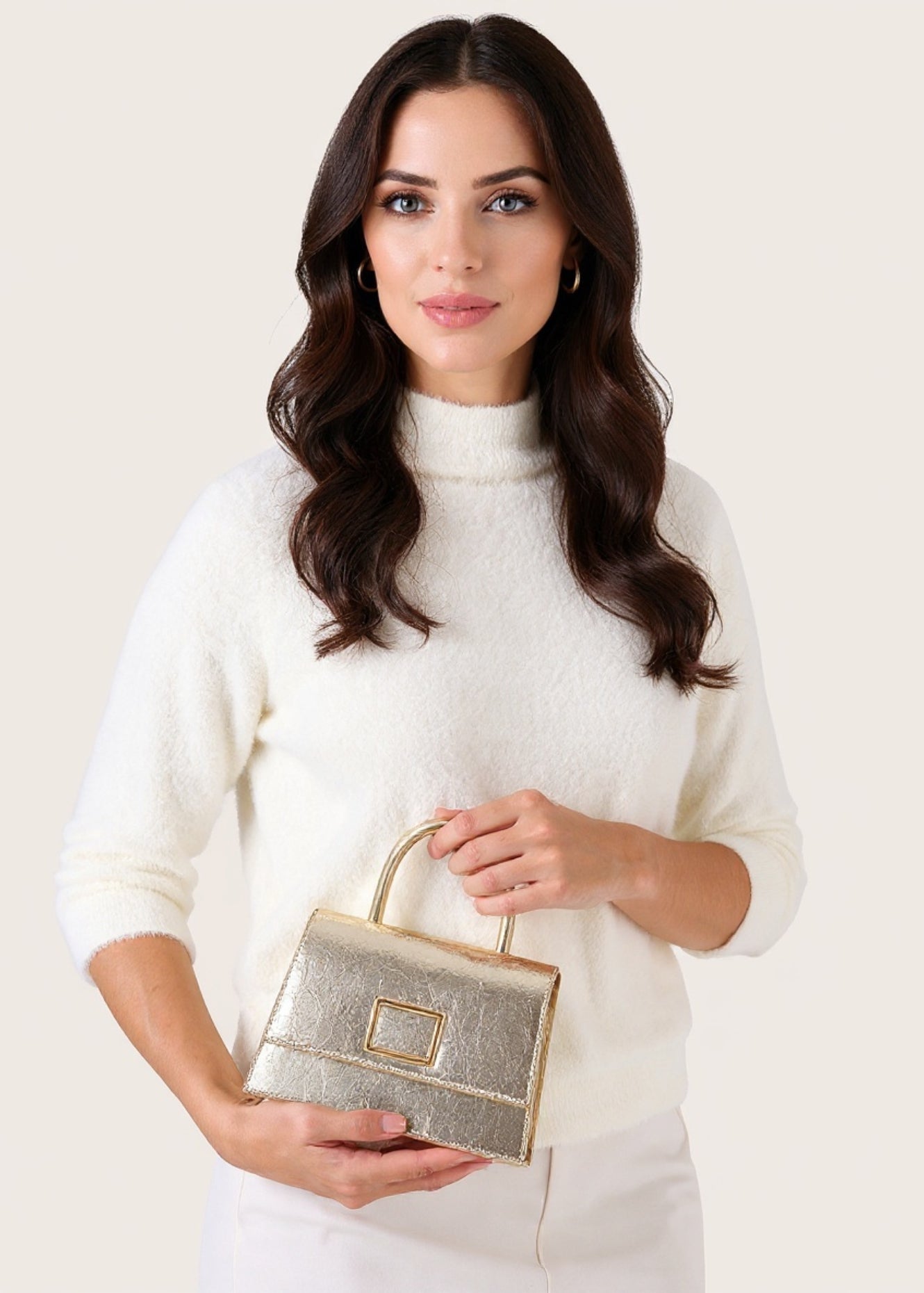 Pochette Baxi in ecopelle martellata