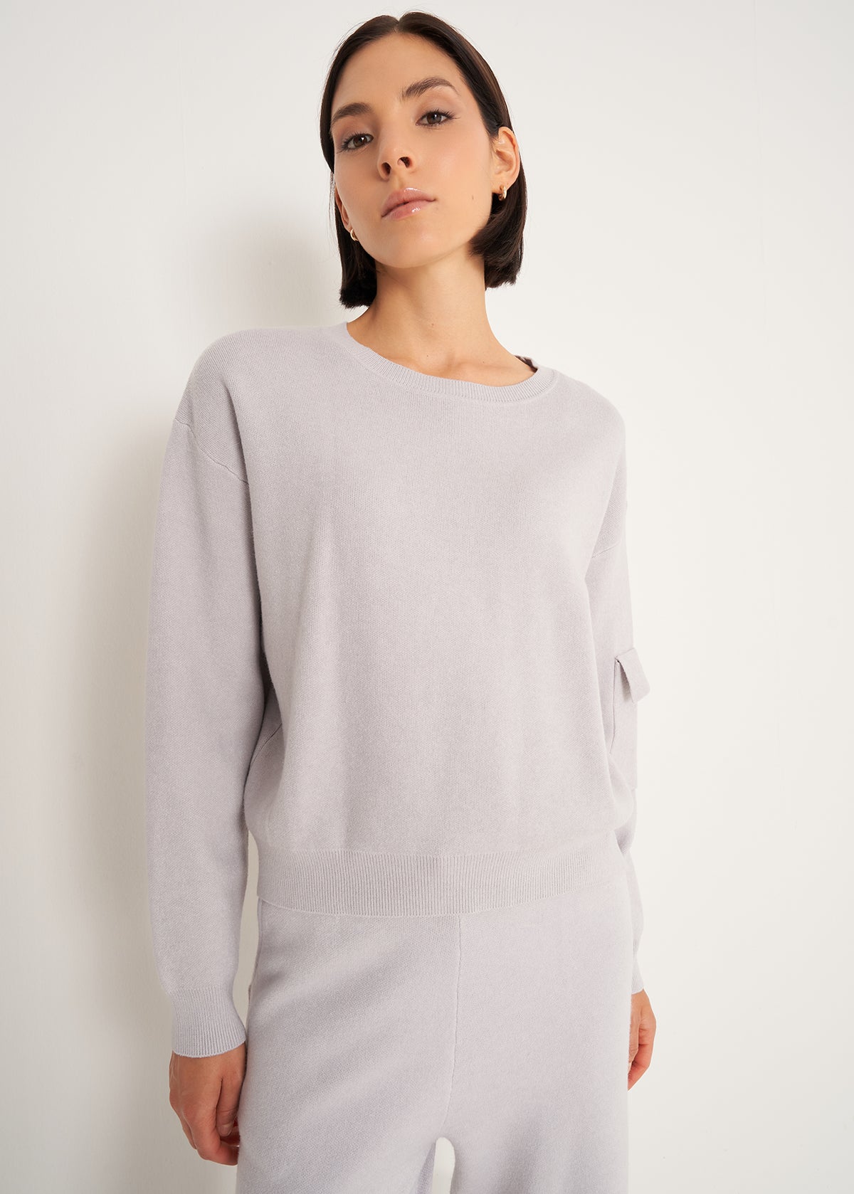 Maglia Monia con tasca sulla manica