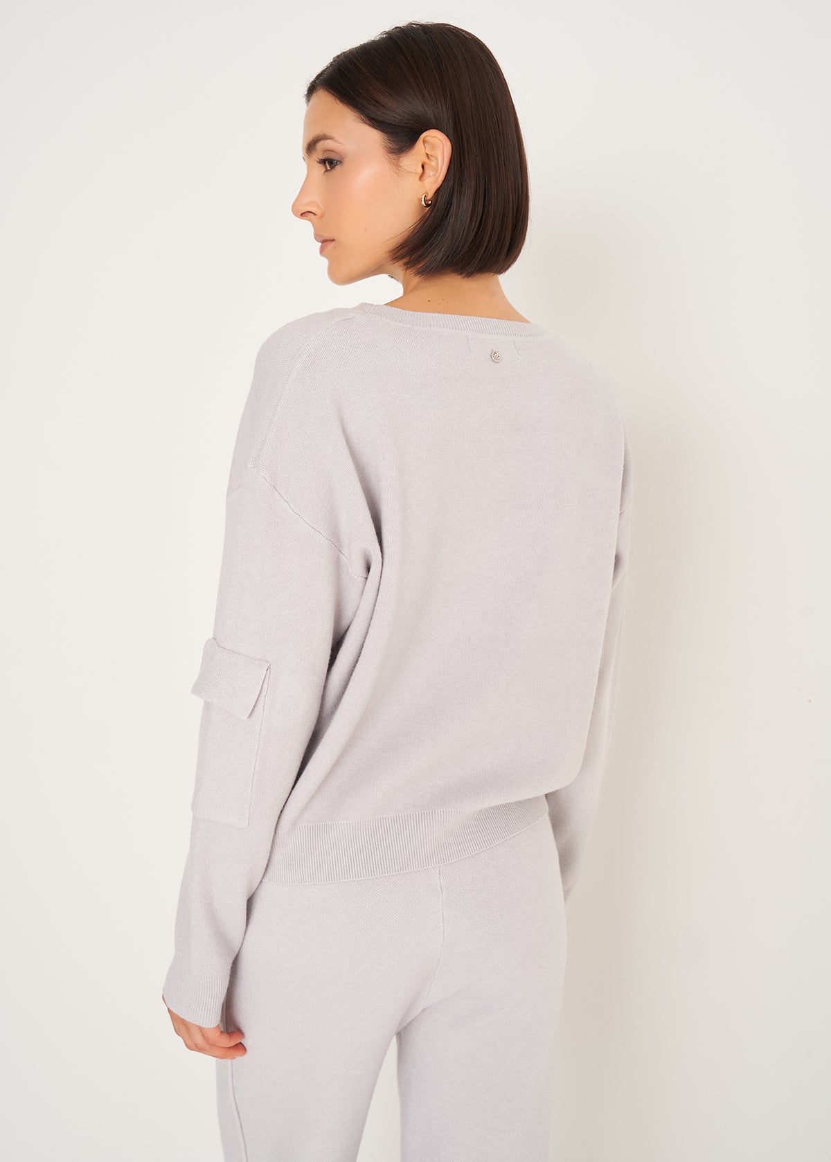 Maglia Monia con tasca sulla manica